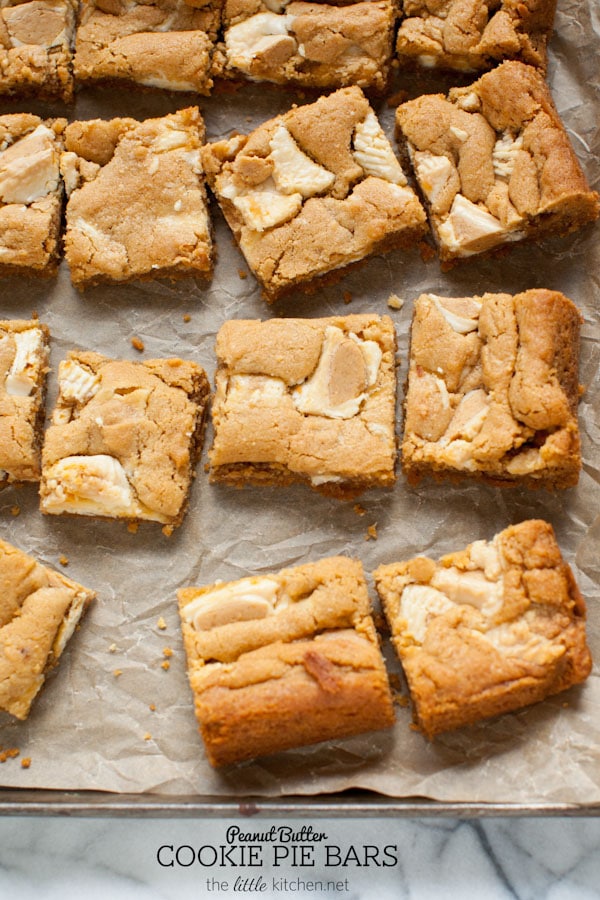 These bars are so easy to make...the crust is made with graham cracker crumbs & I used white chocolate Reese's butter cups! Peanut Butter Cookie Pie Bars from thelittlekitchen.net These bars are so easy to make...the crust is made with graham cracker crumbs & I used white chocolate Reese's butter cups! Peanut Butter Cookie Pie Bars from thelittlekitchen.net
