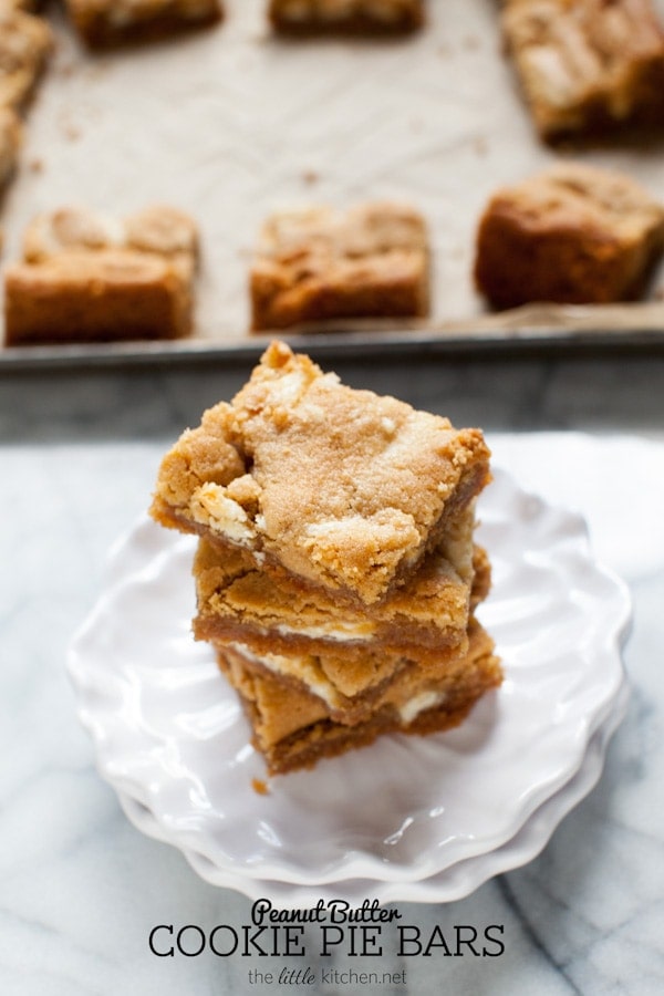 These bars are so easy to make...the crust is made with graham cracker crumbs & I used white chocolate Reese's butter cups! Peanut Butter Cookie Pie Bars from thelittlekitchen.net These bars are so easy to make...the crust is made with graham cracker crumbs & I used white chocolate Reese's butter cups! Peanut Butter Cookie Pie Bars from thelittlekitchen.net
