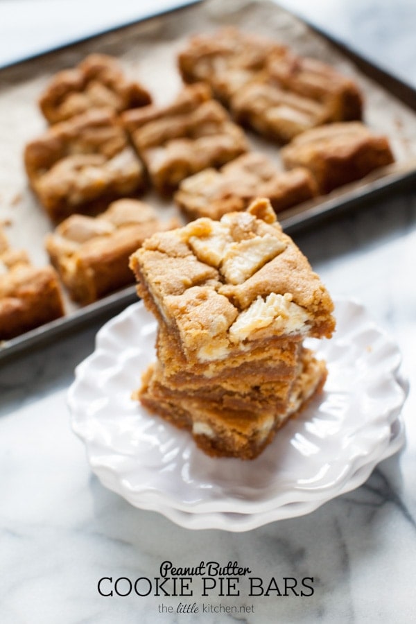 These bars are so easy to make...the crust is made with graham cracker crumbs & I used white chocolate Reese's butter cups! Peanut Butter Cookie Pie Bars from thelittlekitchen.net These bars are so easy to make...the crust is made with graham cracker crumbs & I used white chocolate Reese's butter cups! Peanut Butter Cookie Pie Bars from thelittlekitchen.net