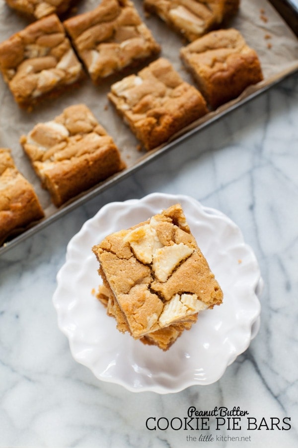 These bars are so easy to make...the crust is made with graham cracker crumbs & I used white chocolate Reese's butter cups! Peanut Butter Cookie Pie Bars from thelittlekitchen.net These bars are so easy to make...the crust is made with graham cracker crumbs & I used white chocolate Reese's butter cups! Peanut Butter Cookie Pie Bars from thelittlekitchen.net