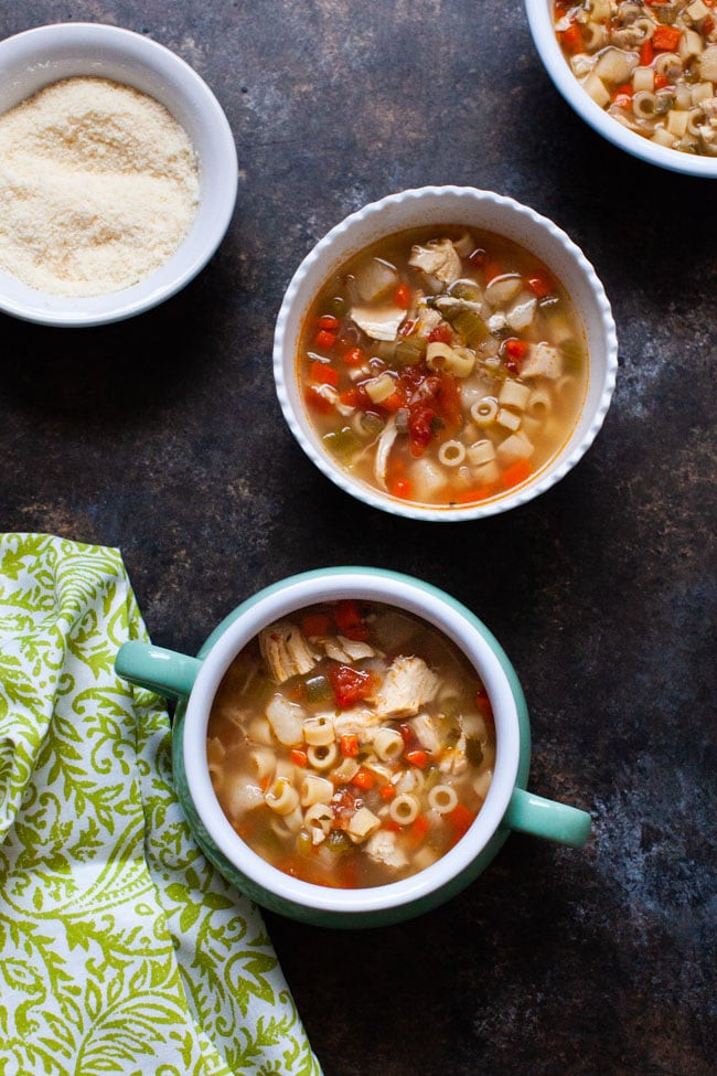 Spicy Chicken Soup from thelittlekitchen.net sicilian chicken soup in a couple of different bowls and a green towel
