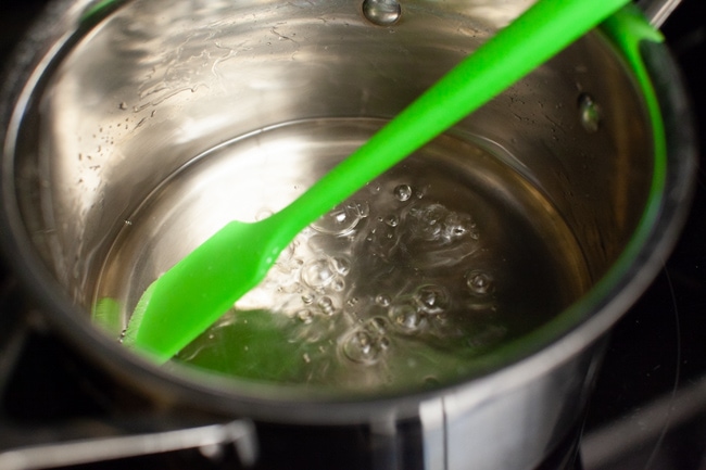 Orange Mint Tea from thelittlekitchen.net simple syrup bubbling in a saucepan