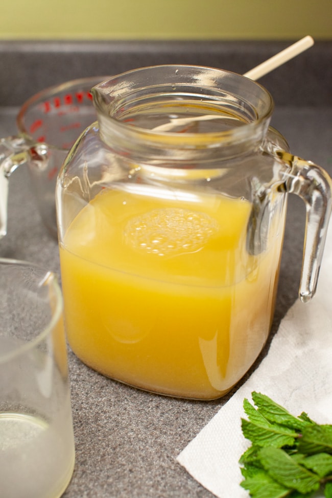 Orange Mint Tea from thelittlekitchen.net orange mint tea in a jug on a kitchen counter