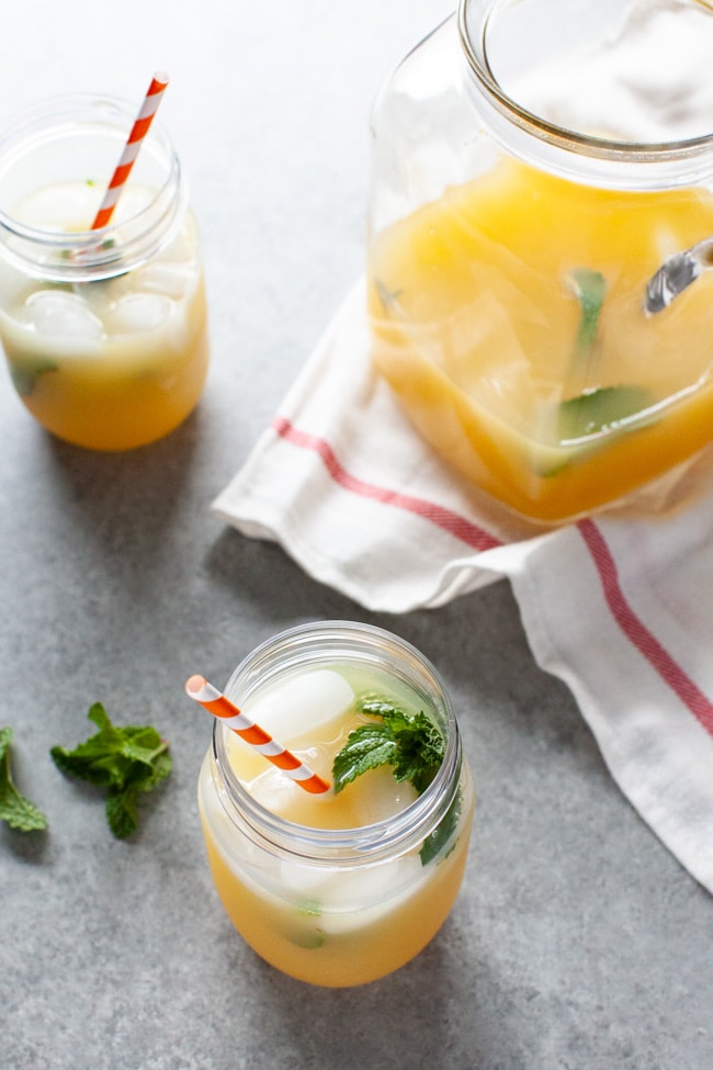 Orange Mint Tea from thelittlekitchen.net orange mint tea in mason jars and fresh mint