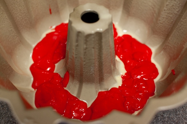 Rainbow Bundt Cake from thelittlekitchen.net Red cake batter in Bundt cake pan