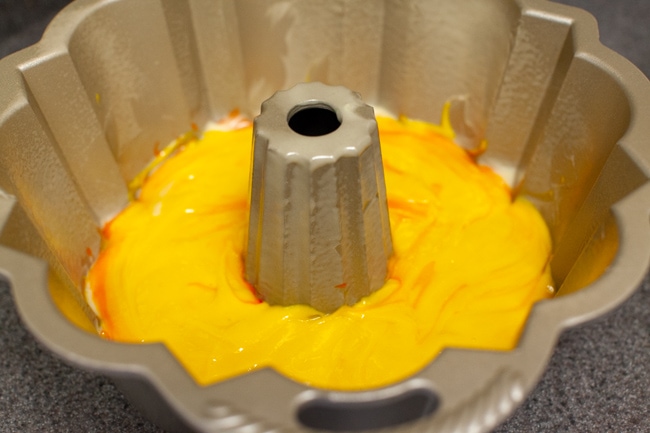 Rainbow Bundt Cake from thelittlekitchen.net Yellow cake batter in Bundt cake pan
