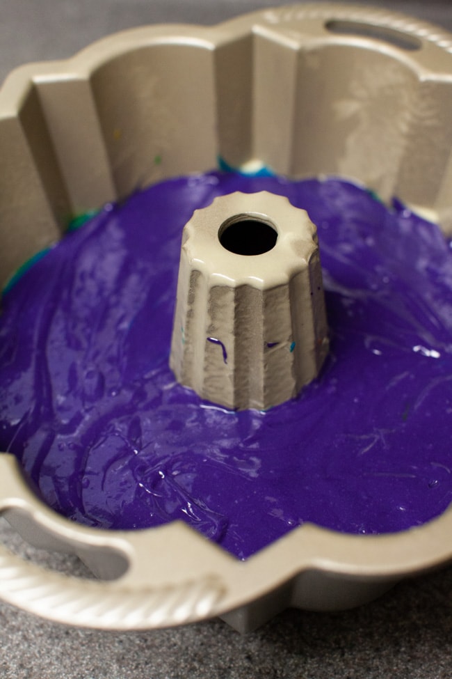 Rainbow Bundt Cake from thelittlekitchen.net Purple cake batter in Bundt cake pan
