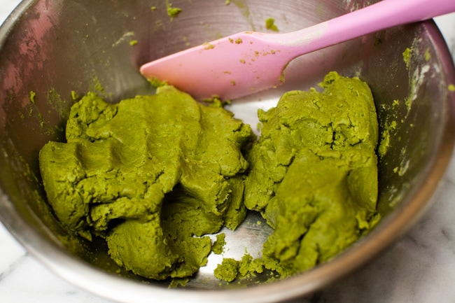 Matcha Cookies from thelittlekitchen.net Matcha Cookie batter in metal mixing bowl with pink rubber spatula from thelittlekitchen.net