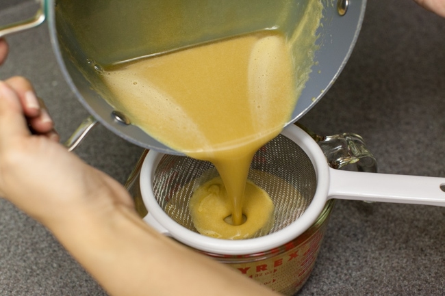 Pouring Sugar Pie filling through strainer Pouring Sugar Pie filling through strainer
