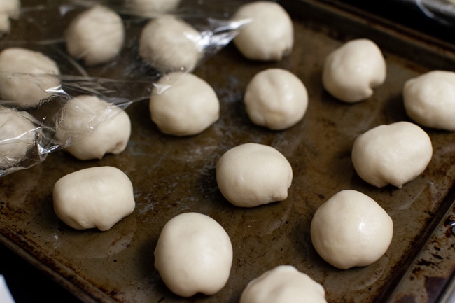Stuffed Bagel Bites from thelittlekitchen.net stuffed bagel bites before baking on a baking sheet