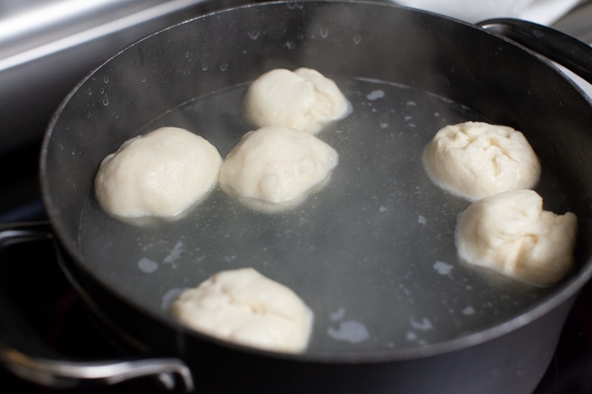 Stuffed Bagel Bites from thelittlekitchen.net stuffed bagel bites in a pot of boiling water