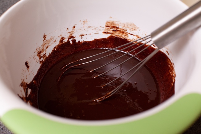 Heart Shaped Chocolate Cake from thelittlekitchen.net whisk in a bowl with chocolate