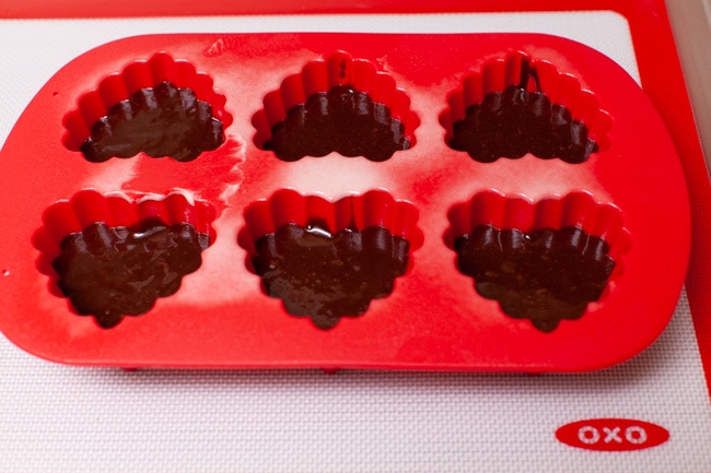 Heart Shape Chocolate Cake from thelittlekitchen.net chocolate cake batter in a heart shaped silicone baking pan