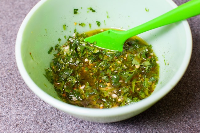 Cilantro Lime Chicken from thelittlekitchen.net cilantro lime marinade for chicken in a green mixing bowl