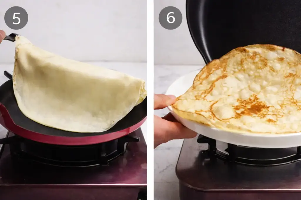Stacking cooked crêpes on plate